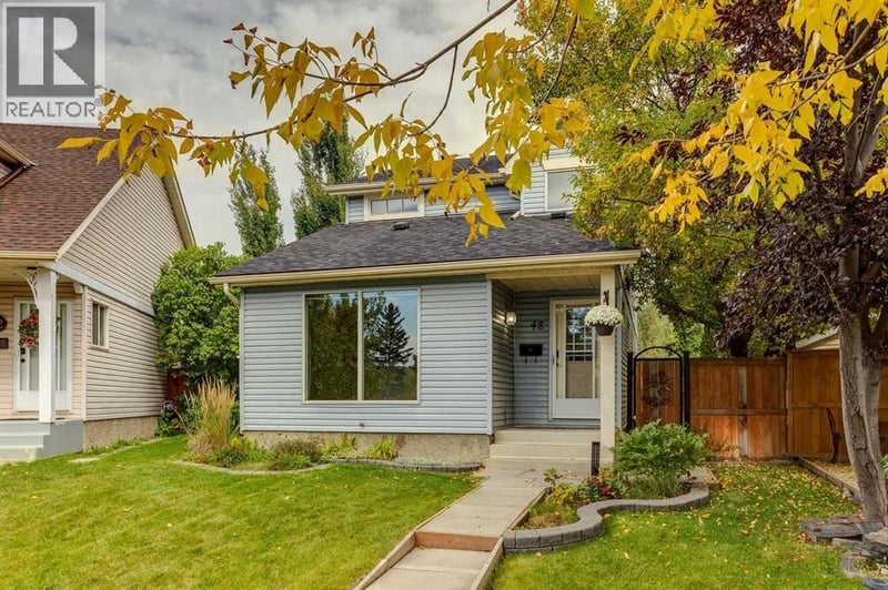 48 Woodglen Court Southwest, Calgary, Alberta, T2W4K3, Calgary, Alberta — photo 1 of 5