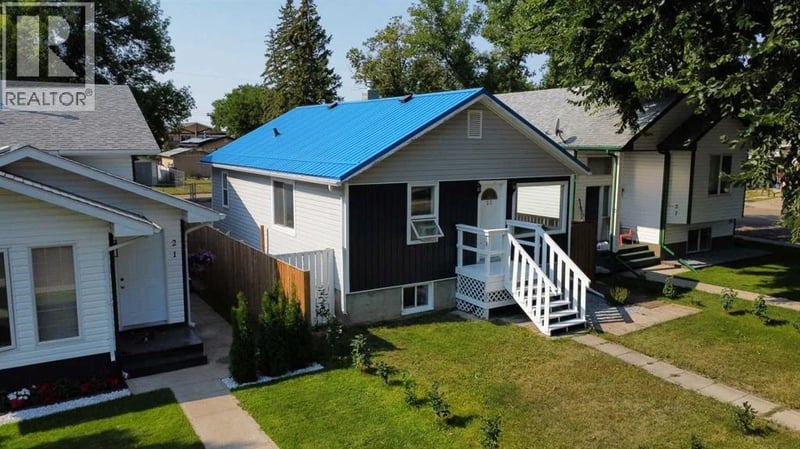 23 Pine Avenue West, Brooks, Alberta, T1A0A1, Brooks, Alberta — photo 1 of 5