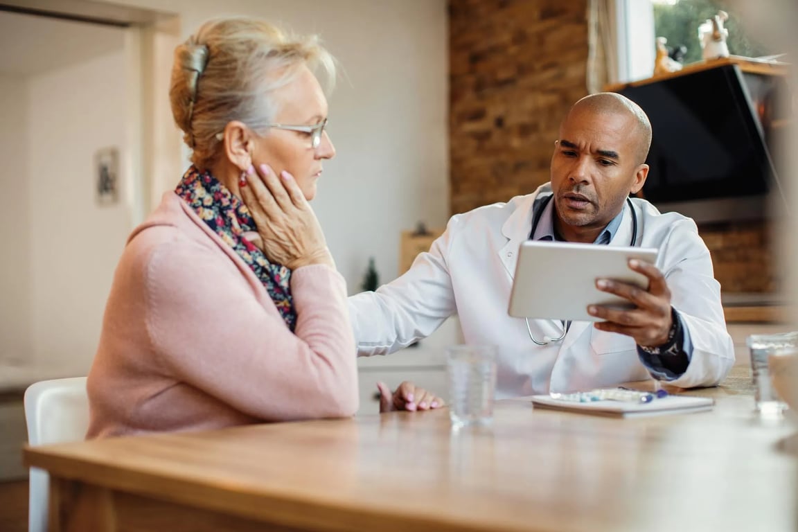Clinician walking a patient through results on a tablet