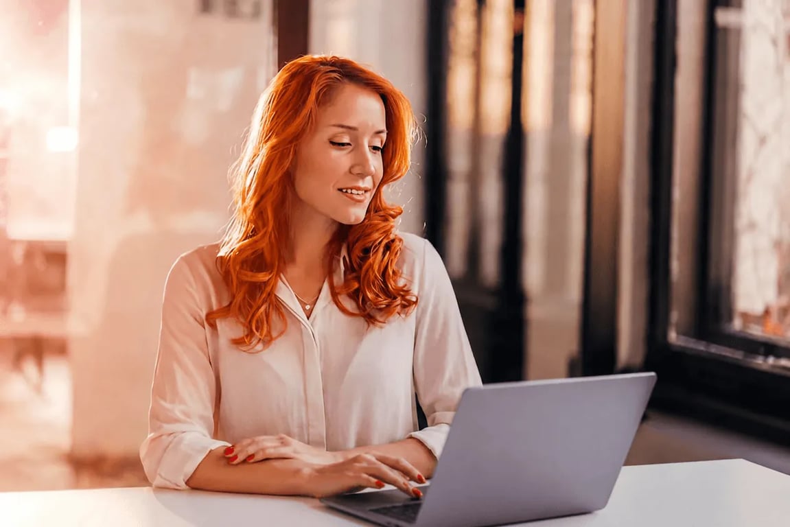Woman completing the Meto intake on her laptop