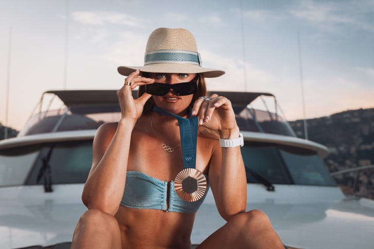 Woman in a bikini and hat on a boat
