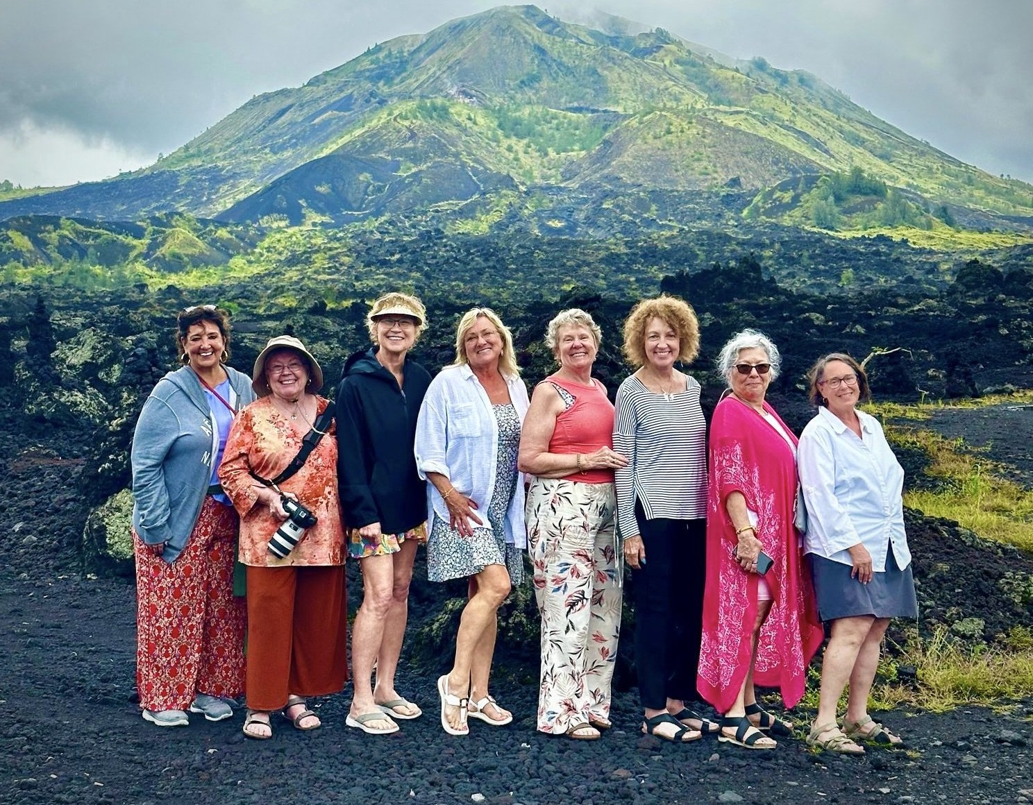 Group of women travelers with mountain background