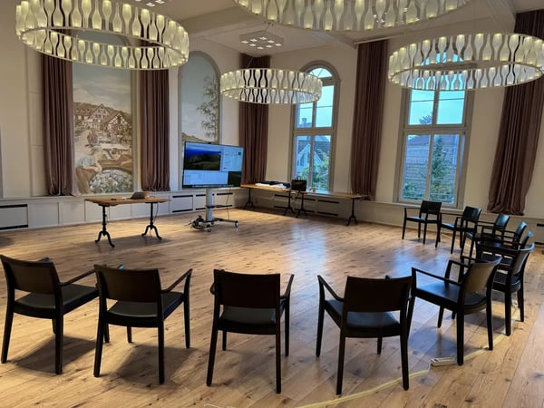 Circle of chairs for a conference or presentation in the Löwen Hall.
