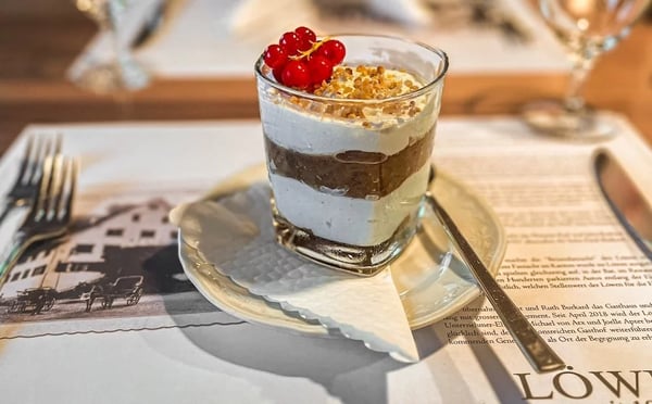 Baked apple tiramisu in a glass with mascarpone