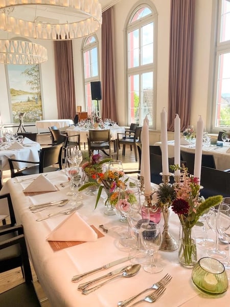 The banquet hall is beautifully decorated and almost ready.