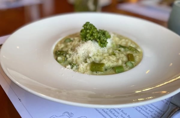 Creamy asparagus risotto with fresh broccoli and grated parmesan.