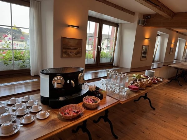 Coffee, croissants, fruit and cake as a welcome at the conference/meeting.