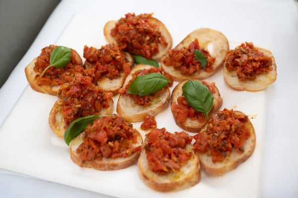 Tomato bruschetta as an appetizer is always well-received by the guests.