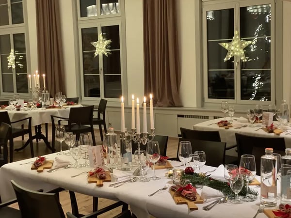 Christmas banquet table with candelabras. Festive atmosphere.