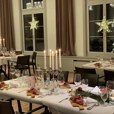 Christmas banquet table with candelabras. Festive atmosphere.