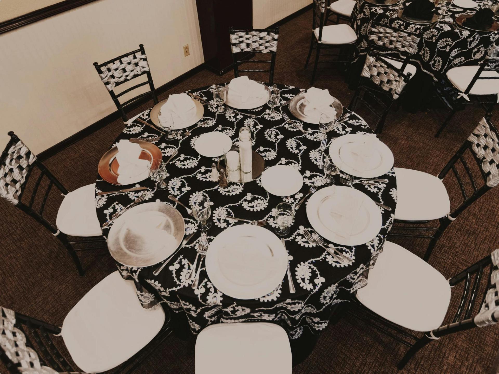 Pacific Room with coastal wall art and lounge seating.