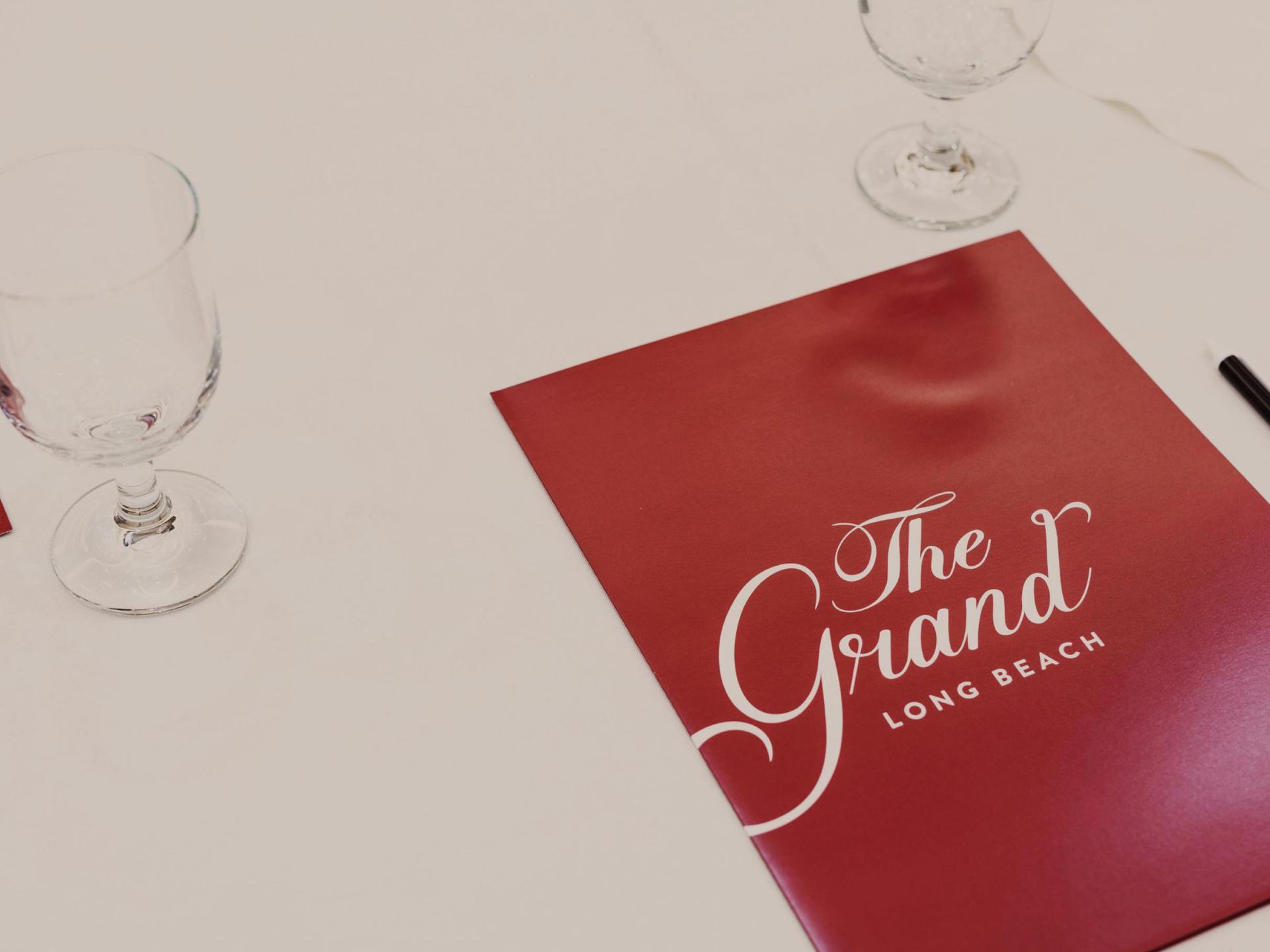 Board Room alternate angle: long table and wall sconces.