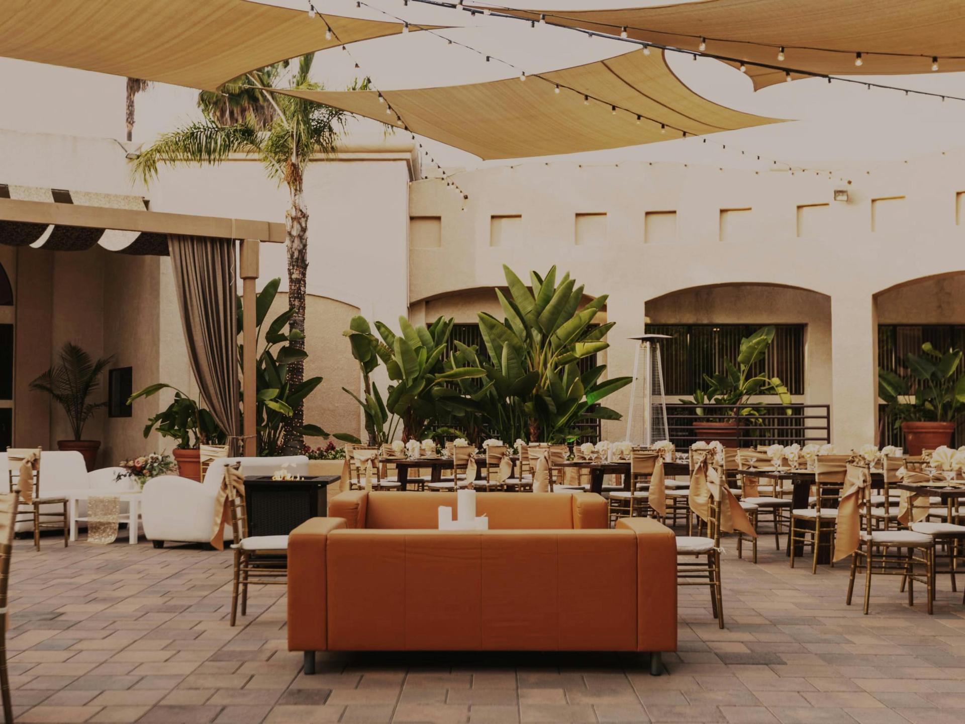 Portrait of a woman in a black blazer (team headshot).