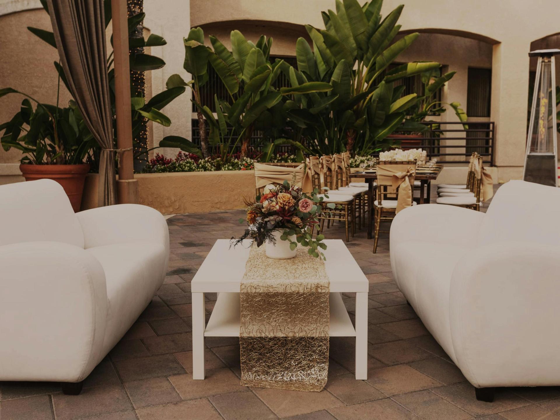 Garden Room with green mural and chandelier.