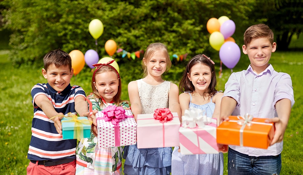 Summer birthday group gift ideas like bikes and trampolines.