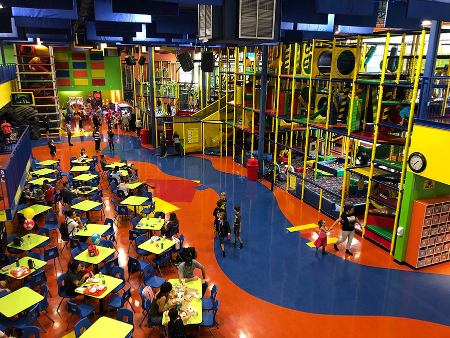 Slides and indoor play structures at Funtropolis Laval