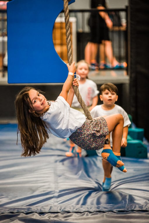 Kids bouncing at Elevation Trampoline indoor park in Montreal