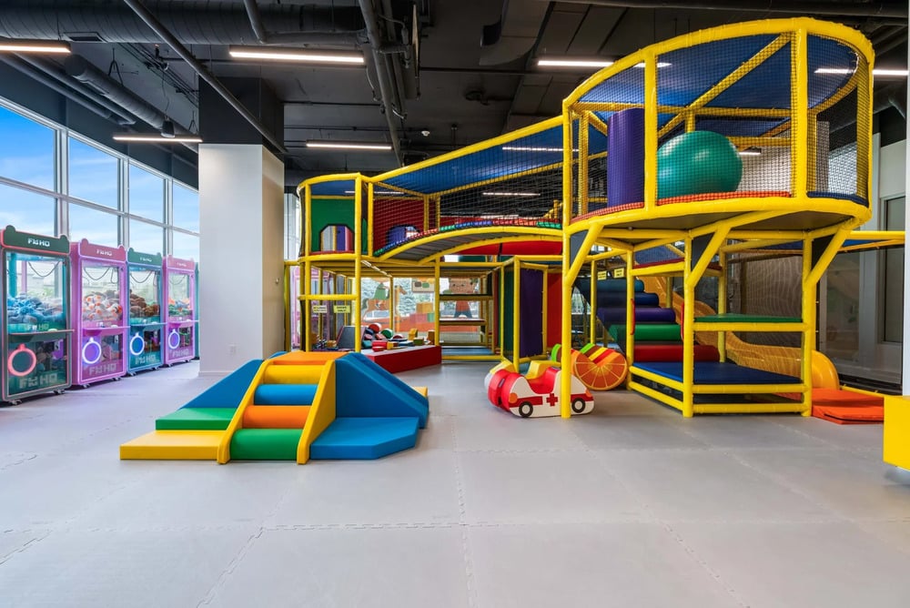 Kids playing at FunHQ Oakville birthday party venue.