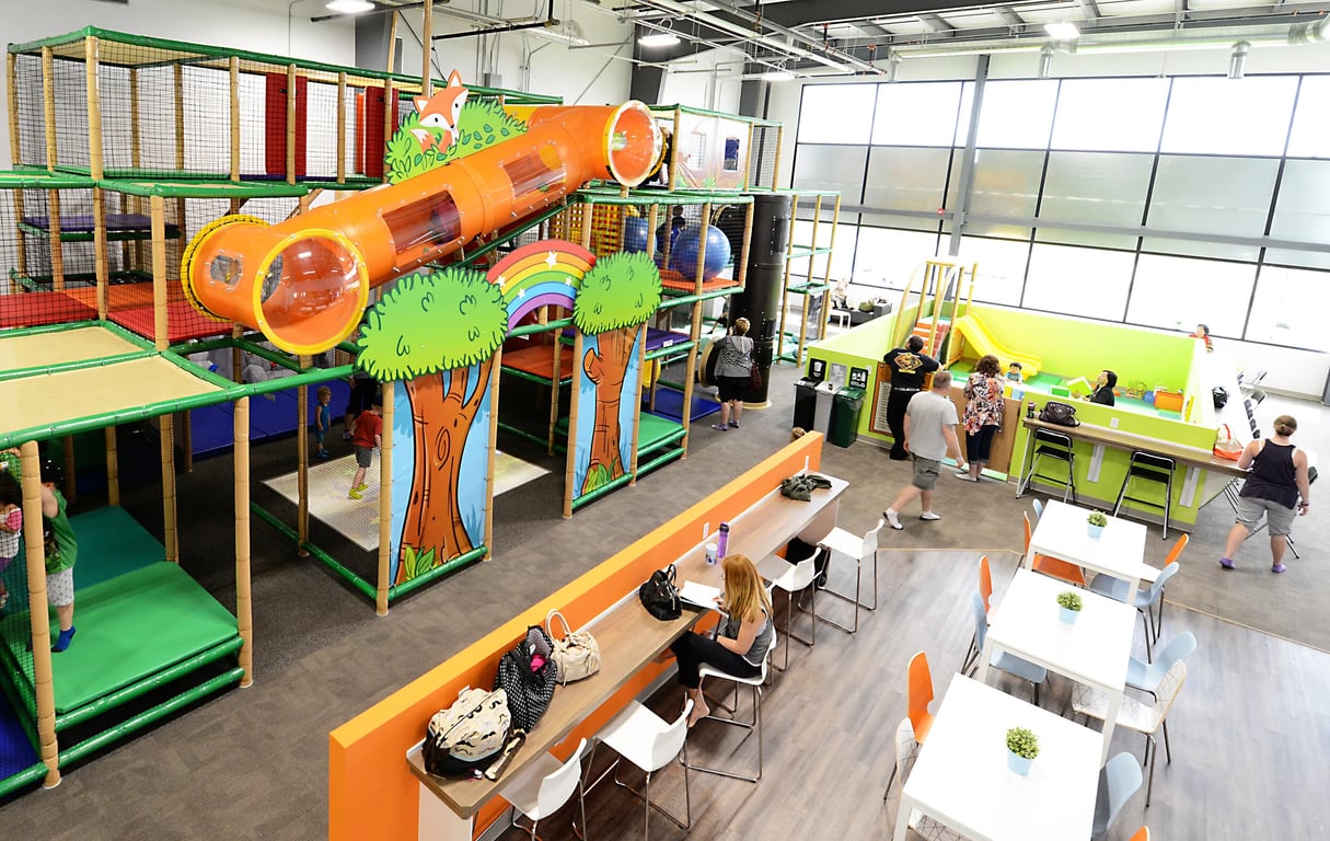 Forest themed indoor playground at Flynn