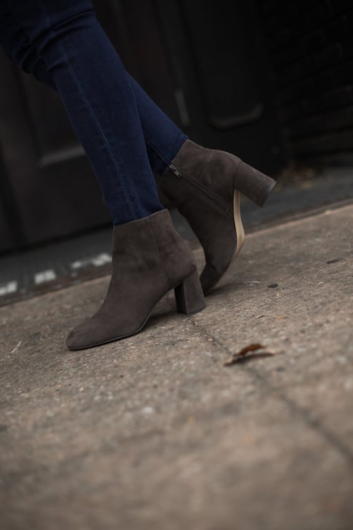 suede boots and denim