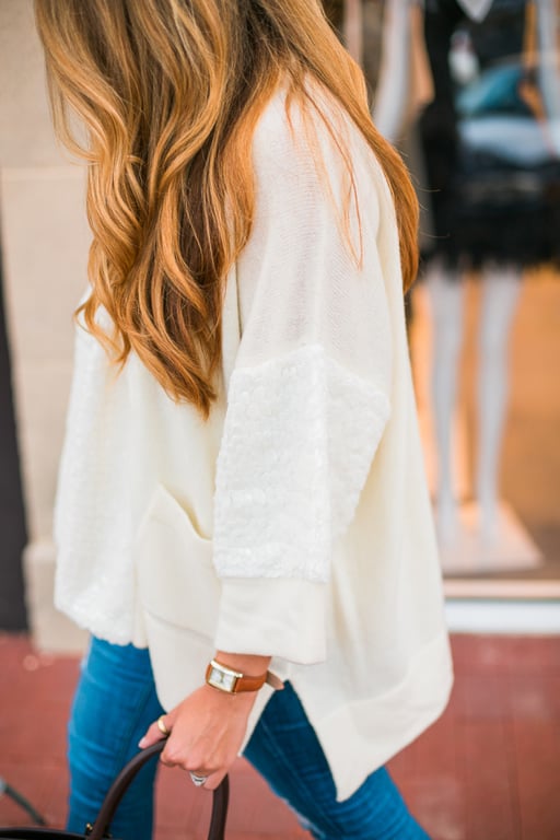 white sweater