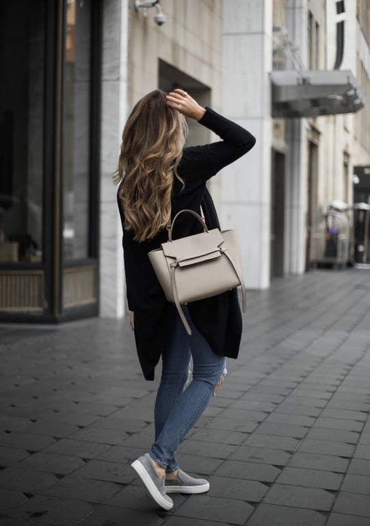 slip-on sneakers and distressed denim