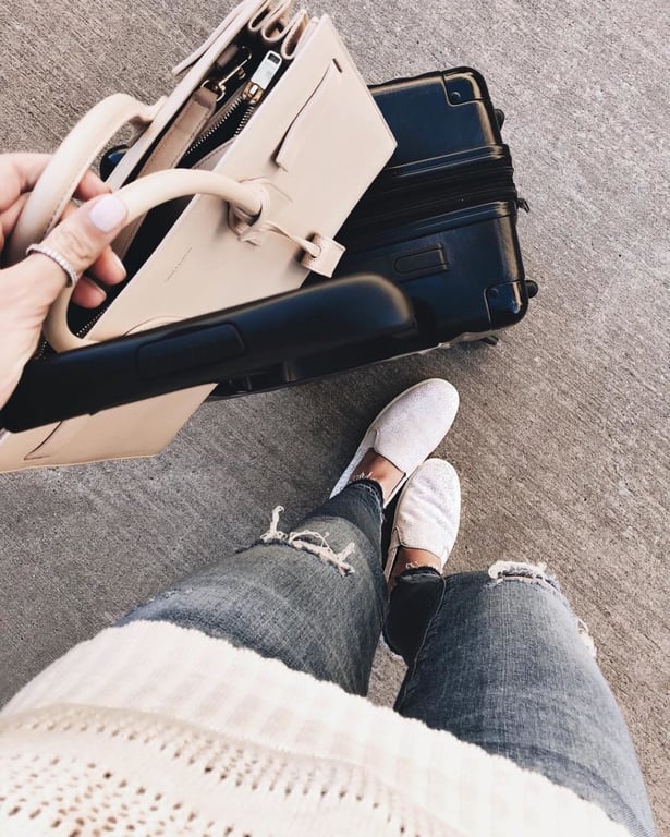 CALPAK Suitcase and VINCE sneakers