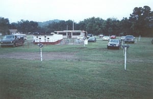 Projection booth and concession stand of the King, with cars awaiting showtime.