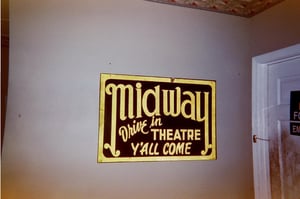 The old Midway Drive-In sign, a true relic of the baby boomer South.  It now hangs in the office of Waldrop Carports, a business that occupies the site.
