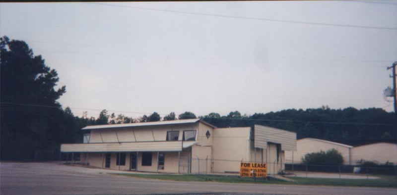 The screen tower of the Midway was torn down in the early 1990s, but its base, designed to be an office or a home, still stands. It's now used as an office.