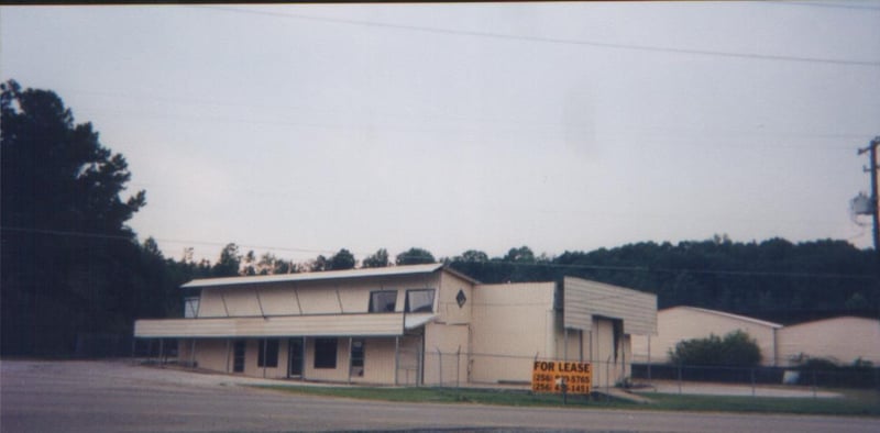 The screen tower of the Midway was torn down in the early 1990s, but its base, designed to be an office or a home, still stands.  It's now used as an office.