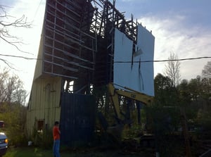 The Piedmont Drive-in screen being demolished.