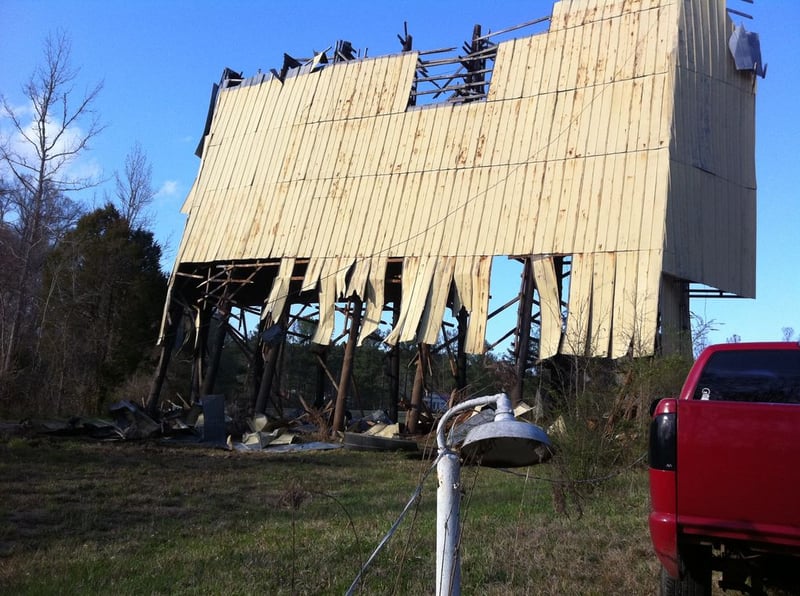 The Piedmont Drive-In screen being demolished.