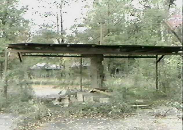 The ticket booth of the Rebel, taken (on videotape) the day the theatre was torn down.
