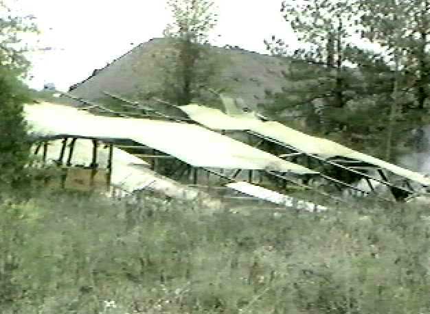 The remains of the Rebel screen tower, minutes after a demolition crew brought it down with a loud, sickening crash.