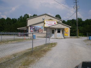 updated photo of the snack barprojection boothticket booth of the Sand Mountain Twin