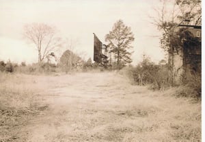 Photo of the Selmont, standing by the sign looking back to the screen