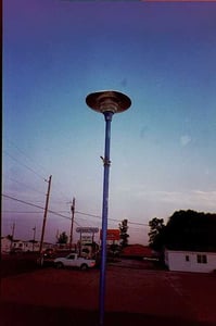 Driveway Lamp for the Grove Drive-In. Located across from the marquee, and was the only one I saw on the property.