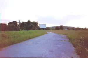 Screen, field, and concession/projection building (which appeared to be used as a residence).