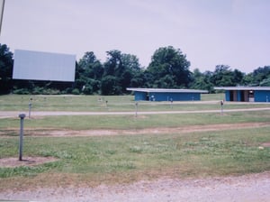 Screen, Projection Booth, Concession Stand, & Speaker Poles.. A real Nice Drive In!