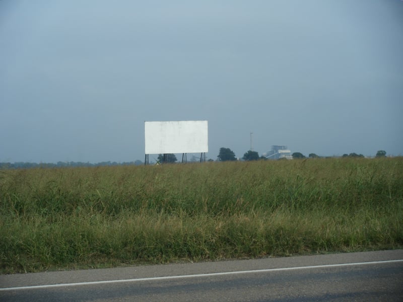 screen behind Charlie's Liquor store