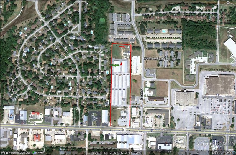 Google Earth image with outline of former site on US-71 and 24th St