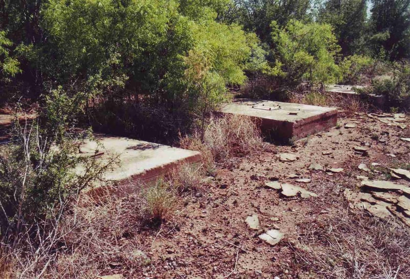 Remaining concrete screen tower foundations