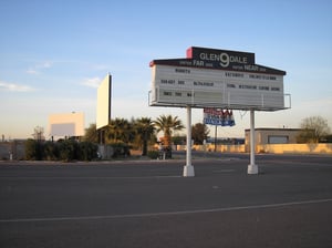 Glendale 9 sign and two screens.