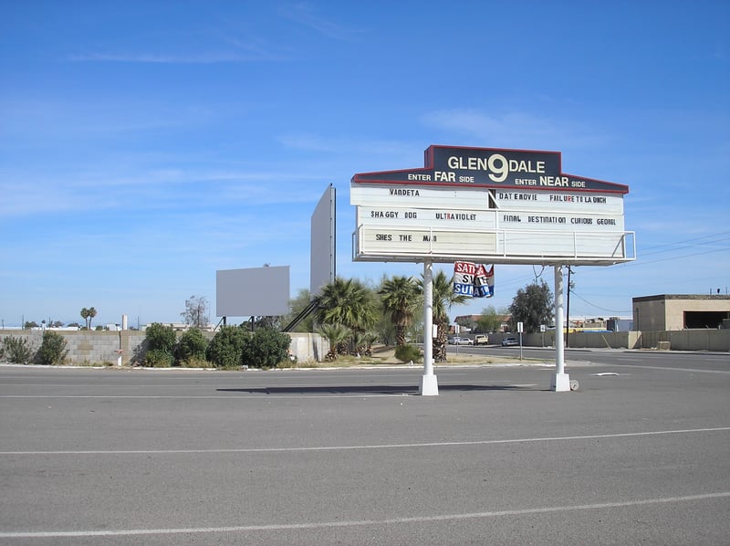 Glendale 9 sign and two screens.