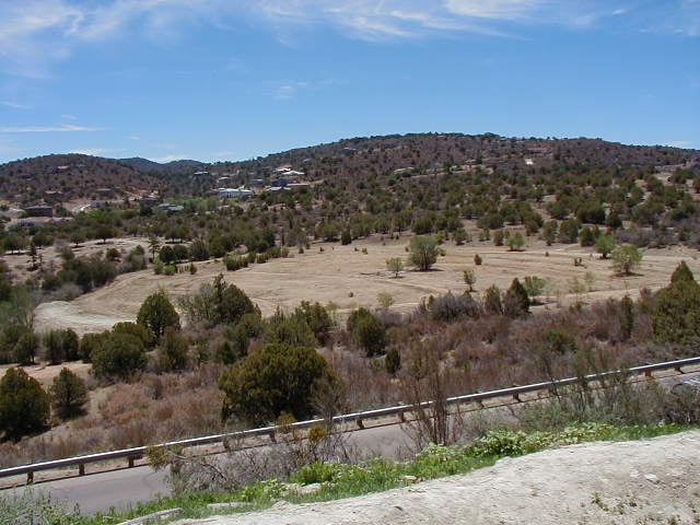 View from hill above the field. Cemetery is center of left edge of picture. White area in lower left is where the screen stood.