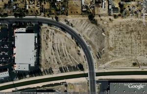 Aerial view of former drive-in site. The road now going thru the area is S. Jesse Ownes Pkwy.
