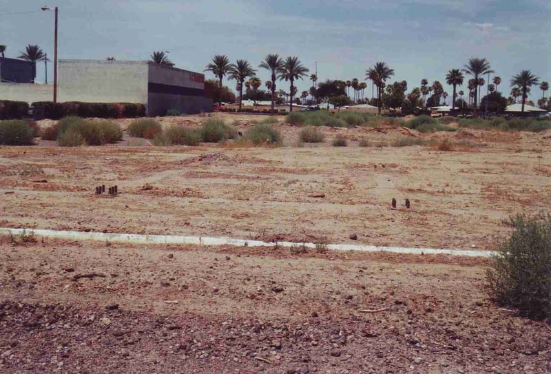 View towards 59th Ave. from the screen tower position. The entrance road is straight ahead where the bushes grow now