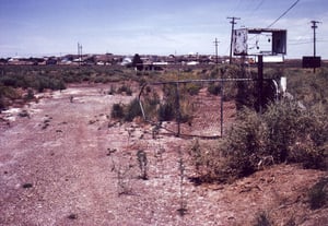 Exit road next to the screen tower with empty cabinet for exit light. The ticket booth is to be seen in the distance