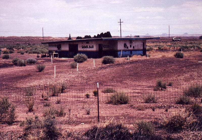 Projection/concession building. The field shows much less shrubs now than 4 years ago. The A/C unit has fallen off the wall